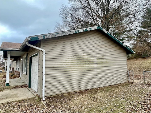 view of home's exterior featuring a garage