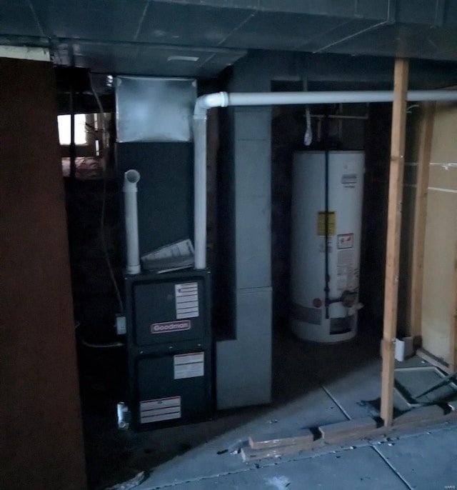 utility room with water heater