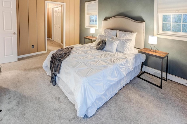 bedroom with light colored carpet