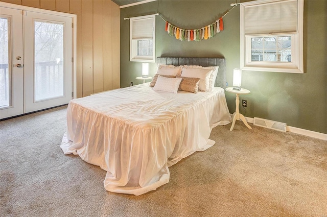 bedroom featuring carpet floors, access to outside, and french doors