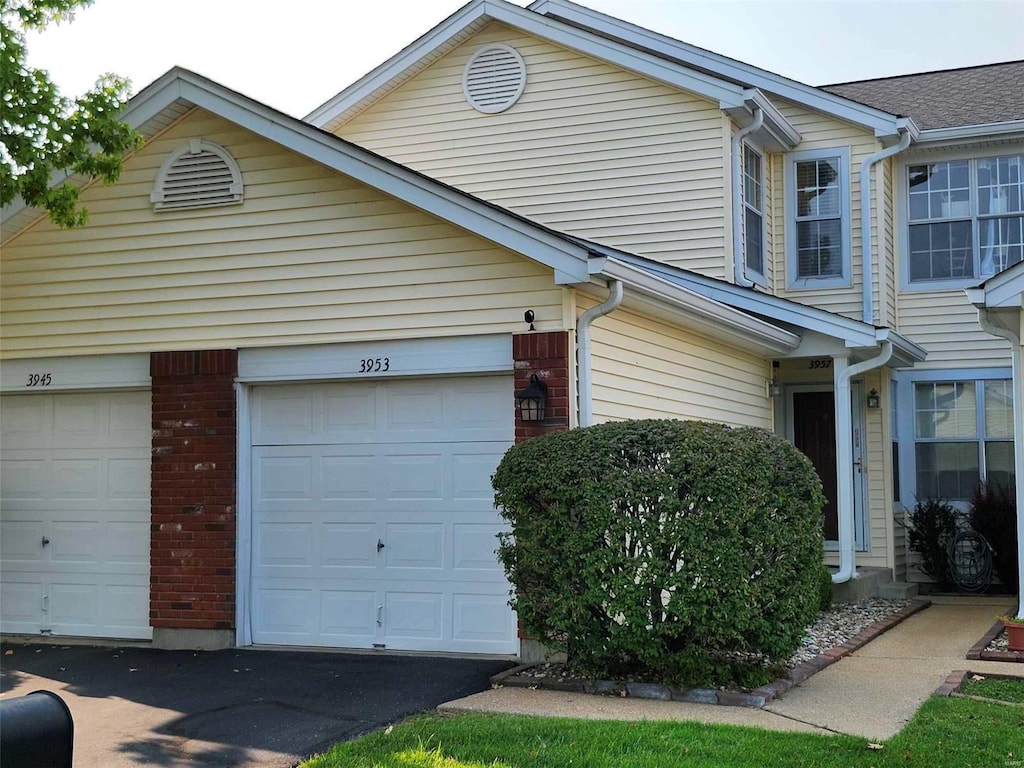 view of home's exterior with a garage