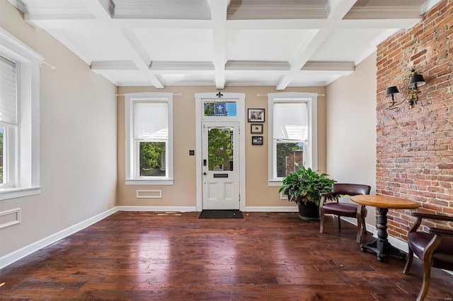 entrance foyer featuring beam ceiling, dark wood-type flooring, and coffered ceiling