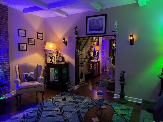 interior space featuring beam ceiling, crown molding, coffered ceiling, and hardwood / wood-style flooring