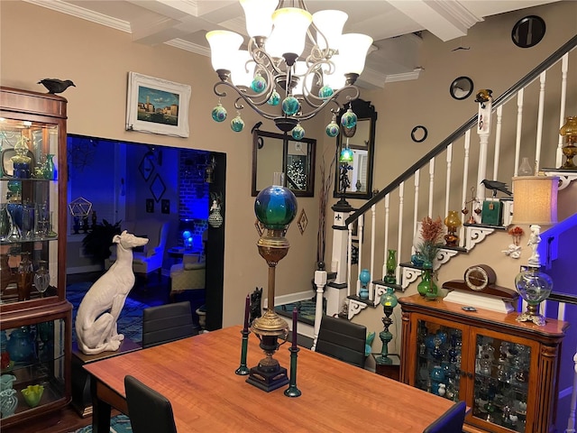 dining space with beam ceiling, crown molding, and an inviting chandelier