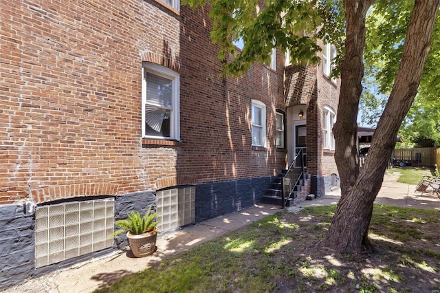 view of building exterior with cooling unit