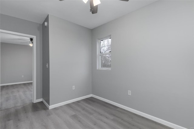 spare room featuring light hardwood / wood-style floors