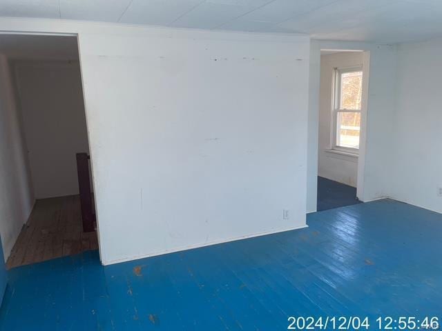 spare room featuring dark hardwood / wood-style flooring