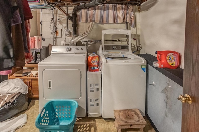 laundry room with washer and dryer