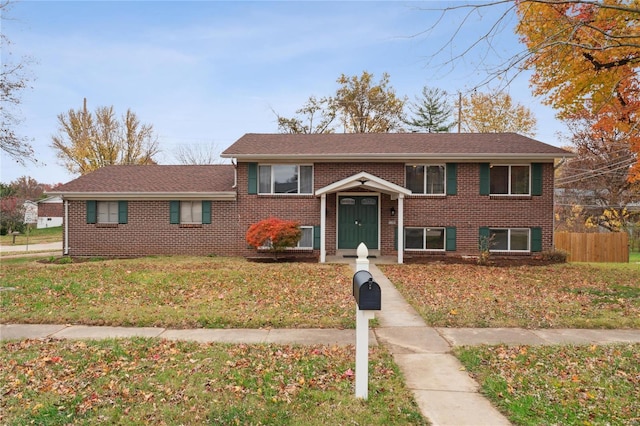 view of front of home with a front lawn