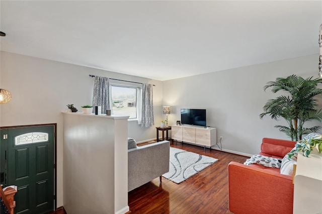 living room with dark hardwood / wood-style floors