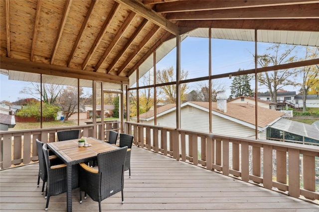 sunroom with vaulted ceiling