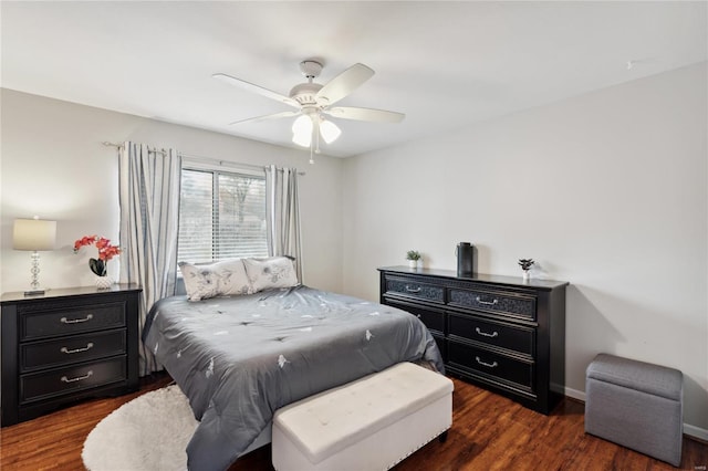 bedroom featuring ceiling fan and dark hardwood / wood-style flooring