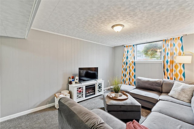 carpeted living room with wooden walls