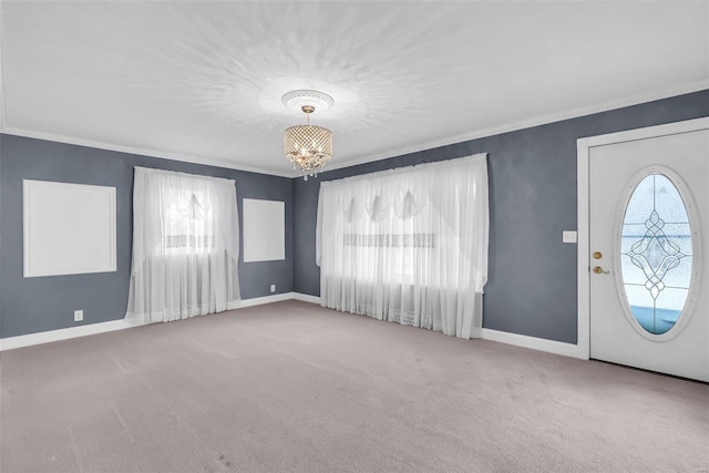 carpeted entryway featuring an inviting chandelier