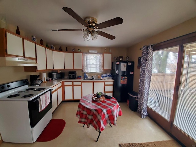 kitchen featuring black appliances, ceiling fan, sink, and white cabinetry