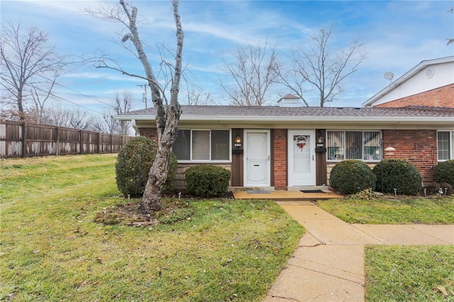 ranch-style house with a front yard