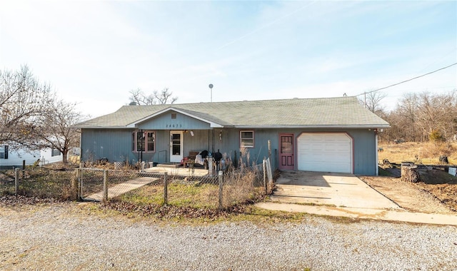 ranch-style home featuring a porch and a garage