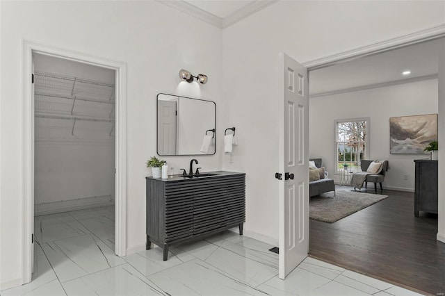 bathroom with vanity and crown molding