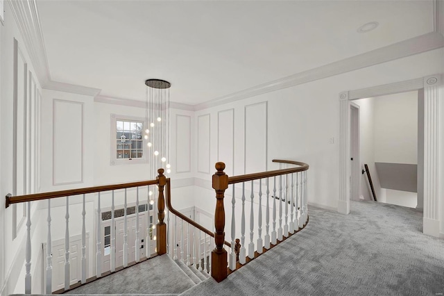 corridor with carpet and ornamental molding