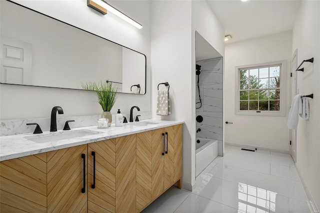 bathroom with vanity, tile patterned floors, and tub / shower combination