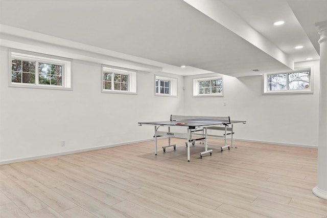 playroom with light hardwood / wood-style floors