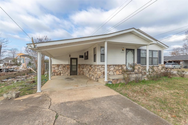 view of front of home featuring a carport