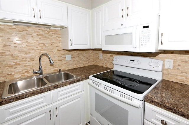 kitchen featuring white cabinets, white appliances, and tasteful backsplash