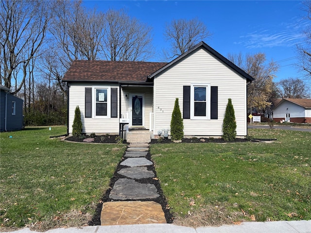 view of front of property with a front lawn