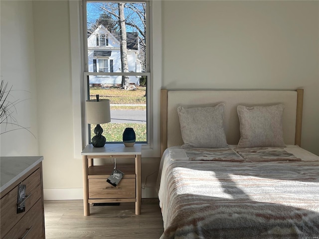 bedroom featuring hardwood / wood-style flooring