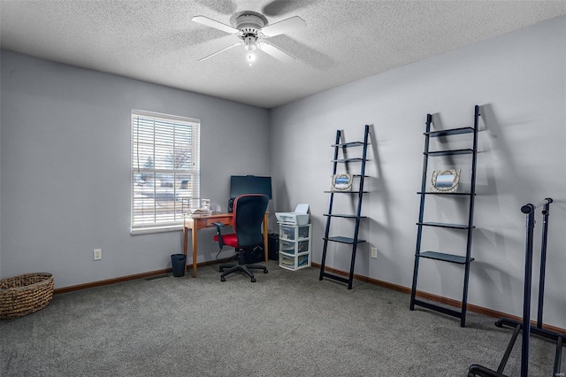 office featuring carpet, a textured ceiling, and ceiling fan