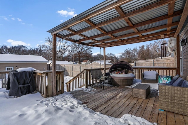 view of snow covered deck