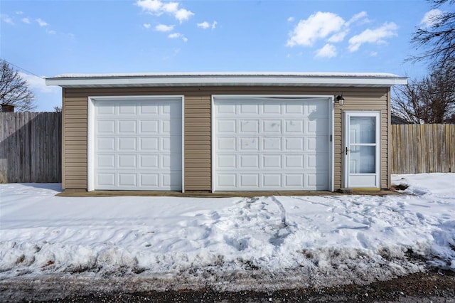 view of snow covered garage