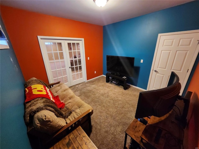 living room featuring french doors and carpet floors