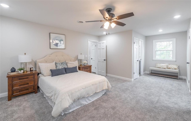 carpeted bedroom with ceiling fan