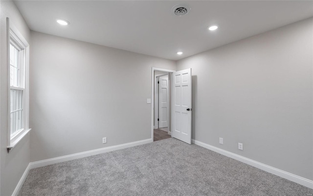 view of carpeted spare room