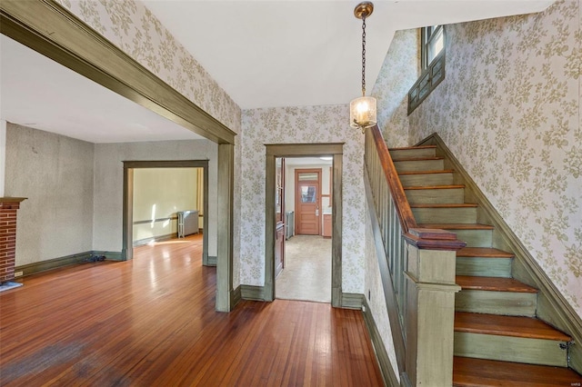 foyer with hardwood / wood-style flooring