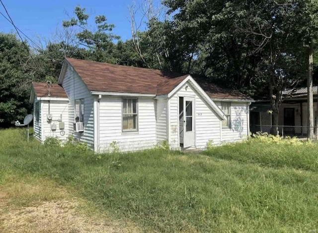 view of outbuilding with cooling unit