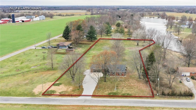 drone / aerial view featuring a rural view and a water view