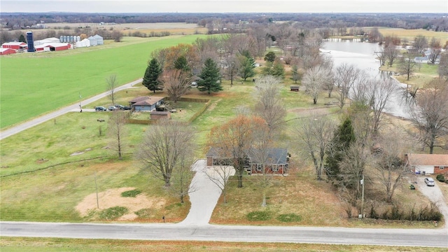 drone / aerial view featuring a rural view and a water view