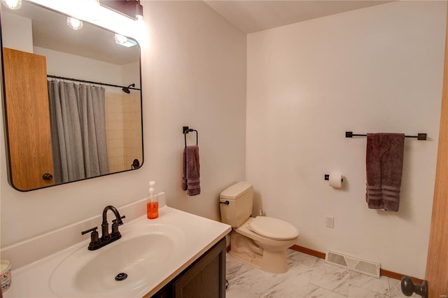 bathroom with walk in shower, vanity, and toilet