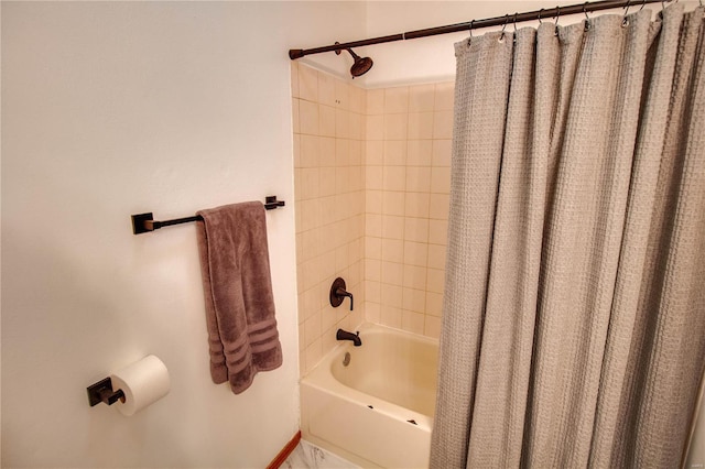 bathroom with shower / tub combo