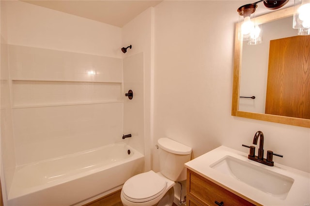 full bathroom with vanity,  shower combination, and toilet