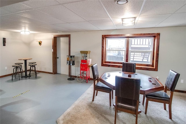 dining area featuring concrete floors