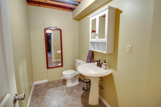 bathroom featuring toilet