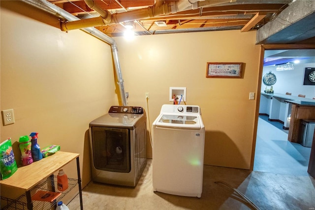 laundry room with washer and dryer