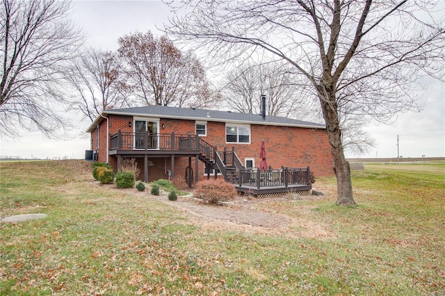 back of house featuring a yard, a deck, and cooling unit