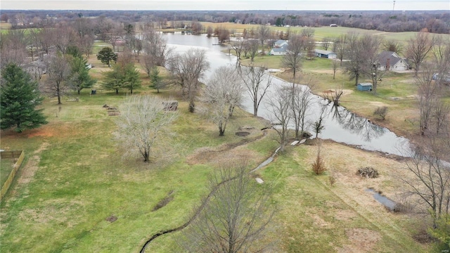 birds eye view of property with a rural view and a water view