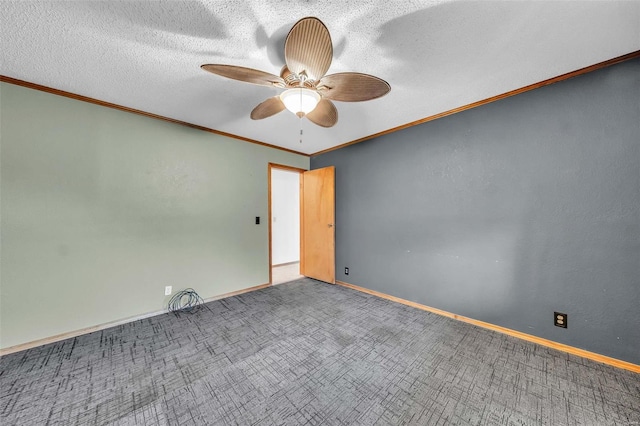 unfurnished room with carpet flooring, ceiling fan, ornamental molding, and a textured ceiling