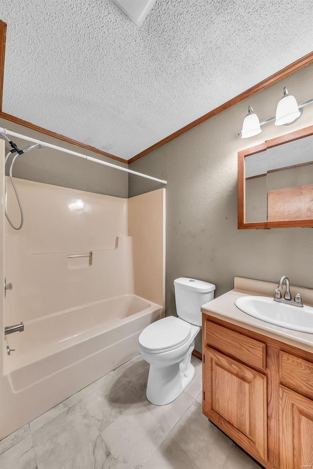 full bathroom featuring vanity, bathtub / shower combination, crown molding, toilet, and a textured ceiling