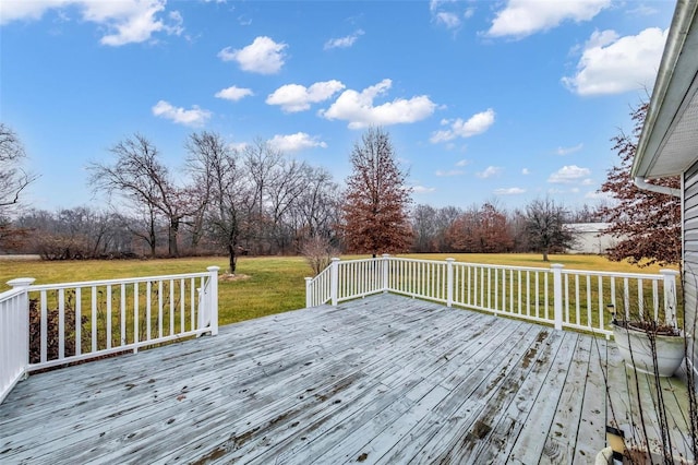 wooden deck with a yard